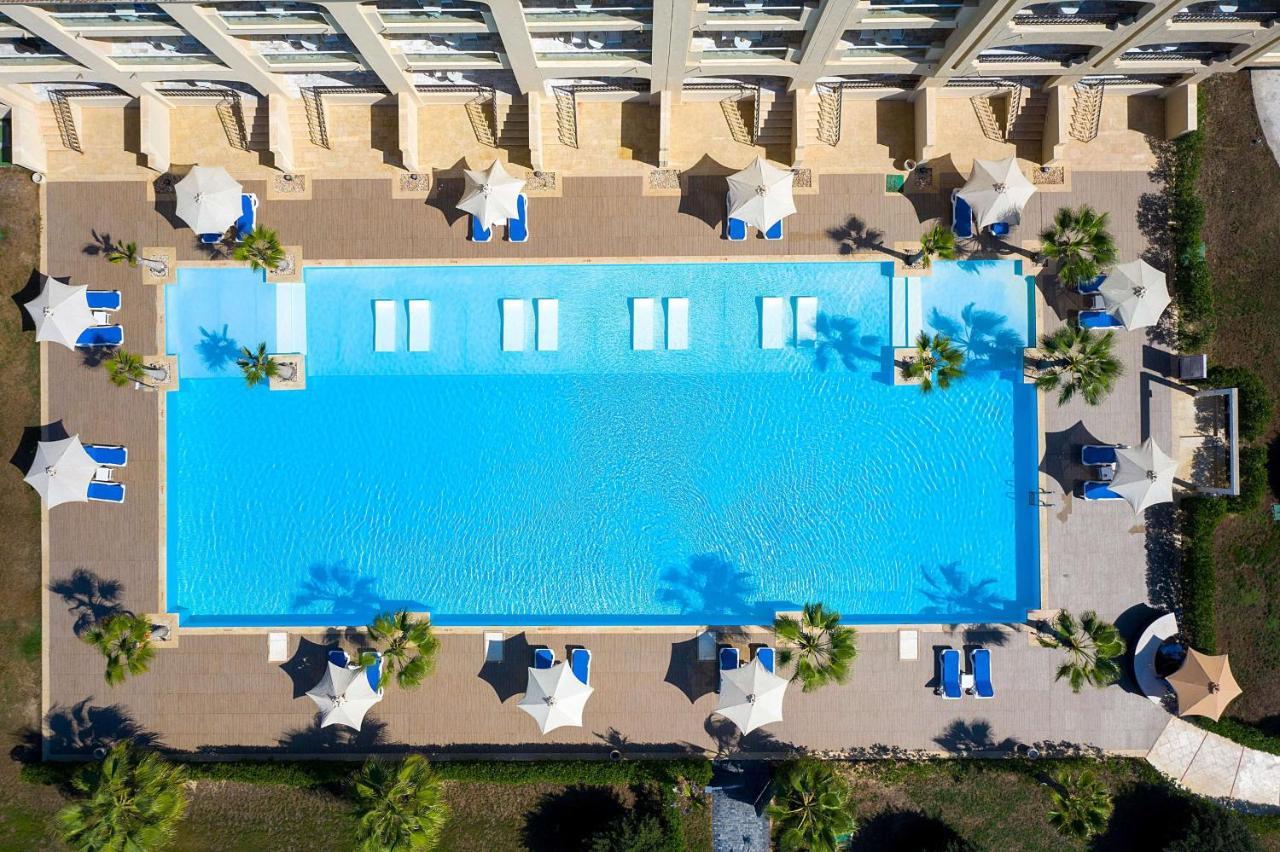 Rixos Alamein - Full Board Plus Ελ Αλαμέιν Εξωτερικό φωτογραφία Aerial view of the pool at the Hilton Mauritius Resort