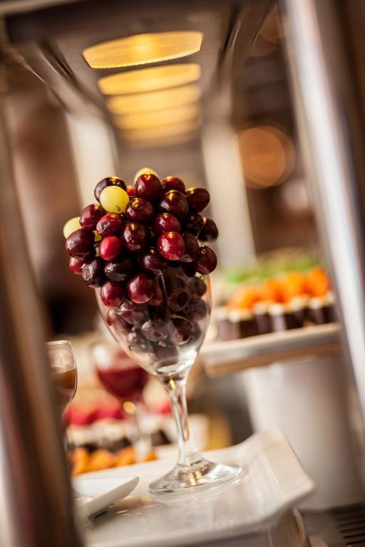 Rixos Alamein - Full Board Plus Ελ Αλαμέιν Εξωτερικό φωτογραφία Grapes in a wine glass