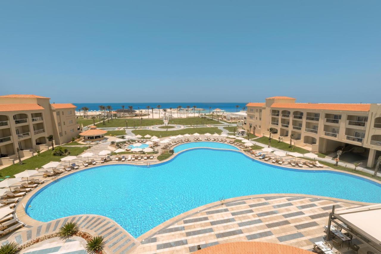 Rixos Alamein - Full Board Plus Ελ Αλαμέιν Εξωτερικό φωτογραφία A pool at a resort in Egypt
